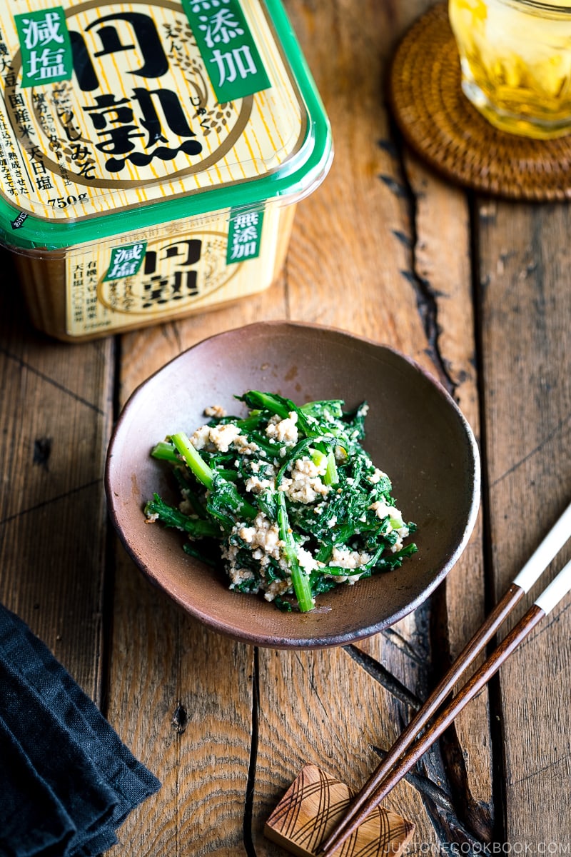 A bizenware containing Chrysanthemum Greens and Tofu Salad (Shungiku Shiraae).