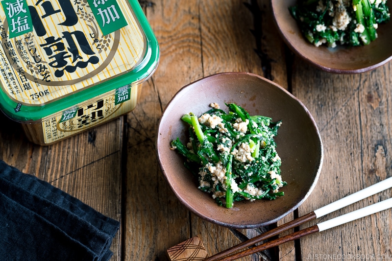 A bizenware containing Chrysanthemum Greens and Tofu Salad (Shungiku Shiraae).