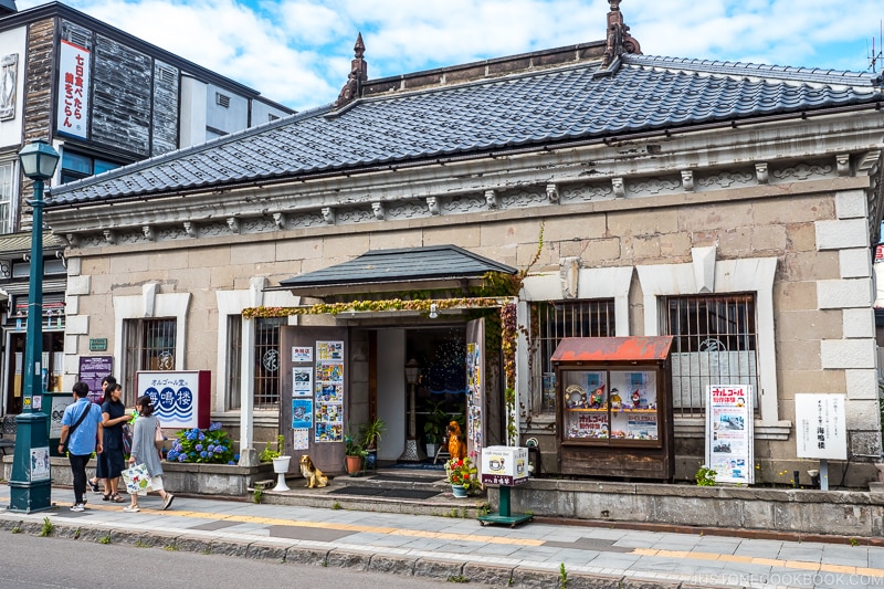 exterior of historic building that's been converted to music box shop Kaimeiro