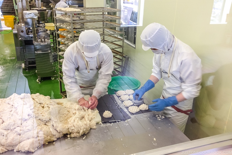 working making tempura from fish paste