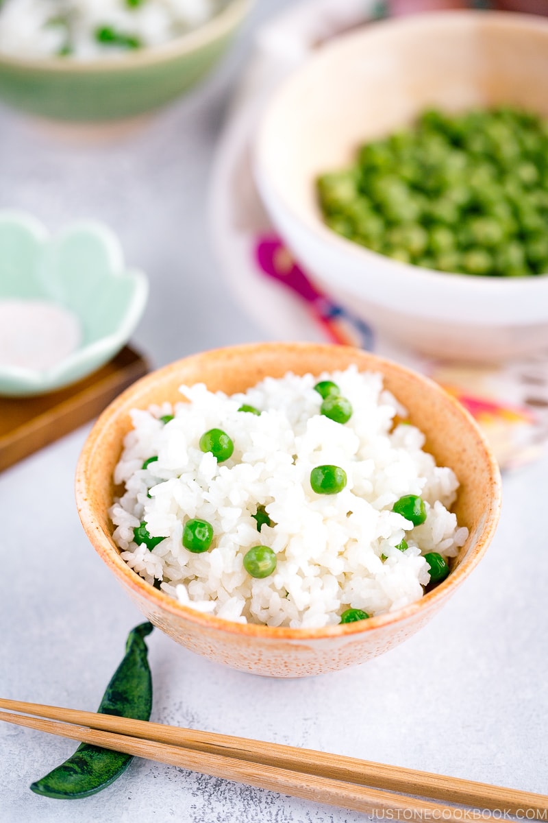 A ceramic rice bowl containing Mame Gohan (Green Pea Rice).