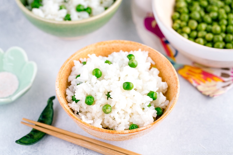A ceramic rice bowl containing Mame Gohan (Green Pea Rice).