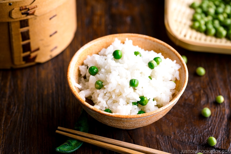 A ceramic rice bowl containing Mame Gohan (Green Pea Rice).