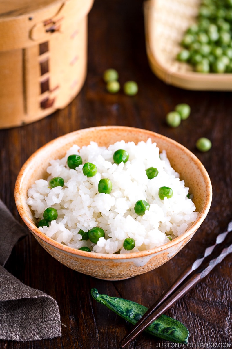 A ceramic rice bowl containing Mame Gohan (Green Pea Rice).