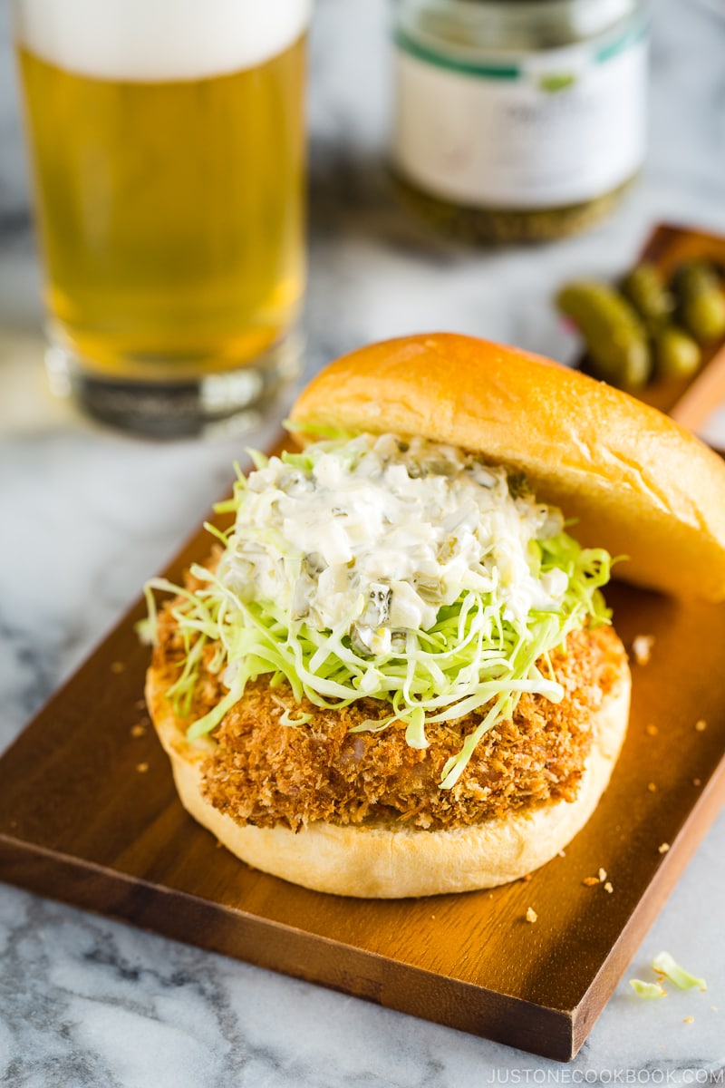 A ebi katsu burger (shrimp cutlet burger) on the mini cutting board.