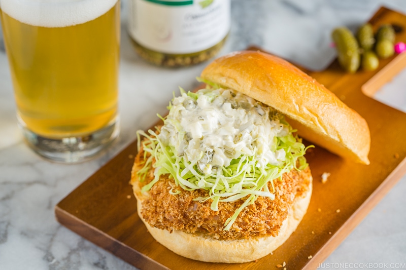 A ebi katsu burger (shrimp cutlet burger) on the mini cutting board.