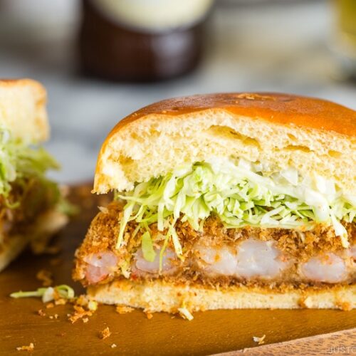 A ebi katsu burger (shrimp cutlet burger) on the mini cutting board.