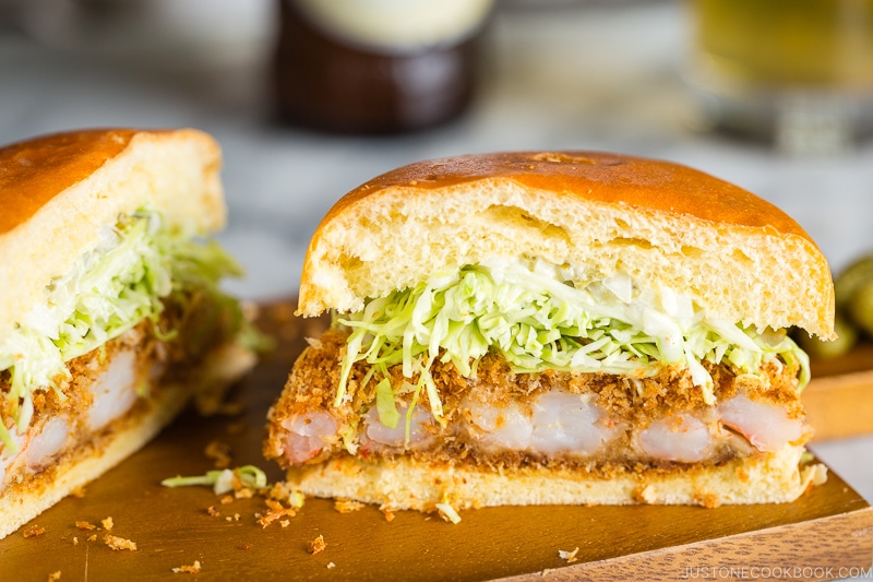 A ebi katsu burger (shrimp cutlet burger) on the mini cutting board.