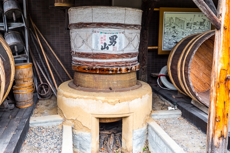 a large container on top of a wood stove