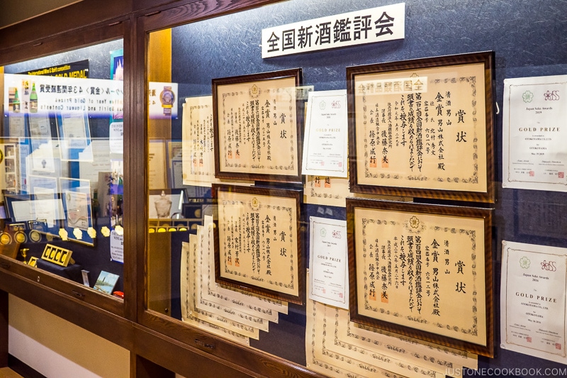 award certificates displayed on a wall