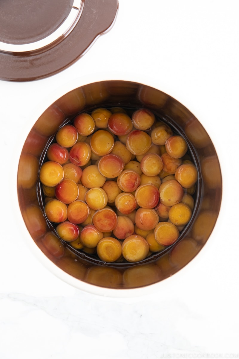 A crock containing ume plums.