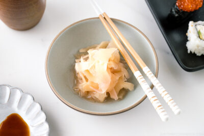 A ceramic bowl containing freshly made Pickled Sushi Ginger (Gari).