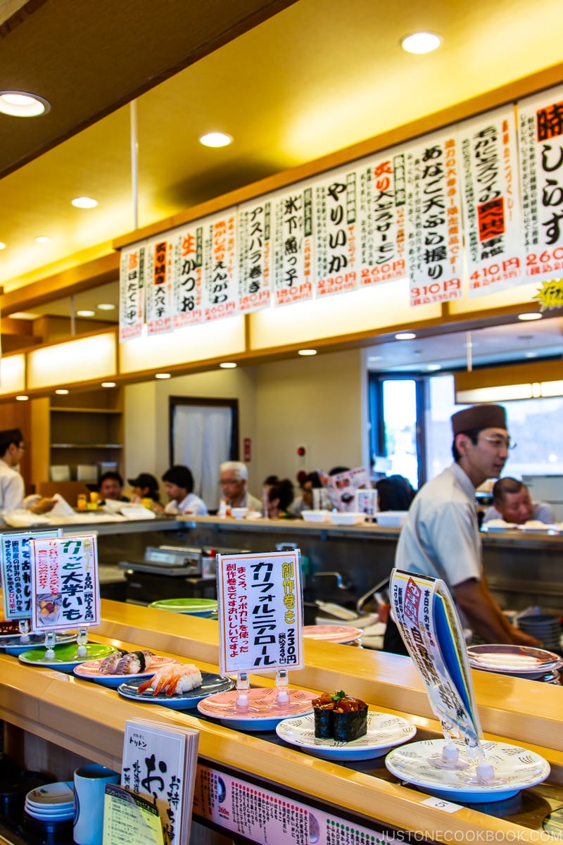 sushi on plates at conveyor belt sushi Toppi sushi
