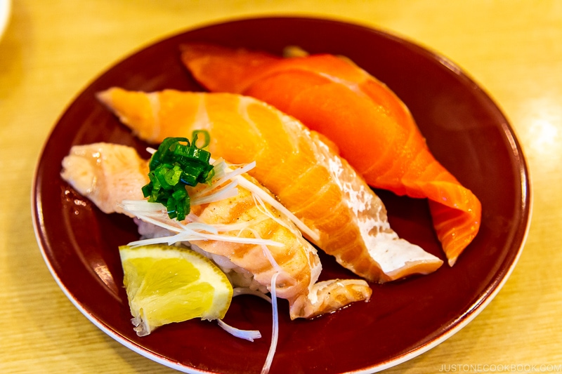 assorted salmon sushi at conveyor belt sushi Toppi sushi