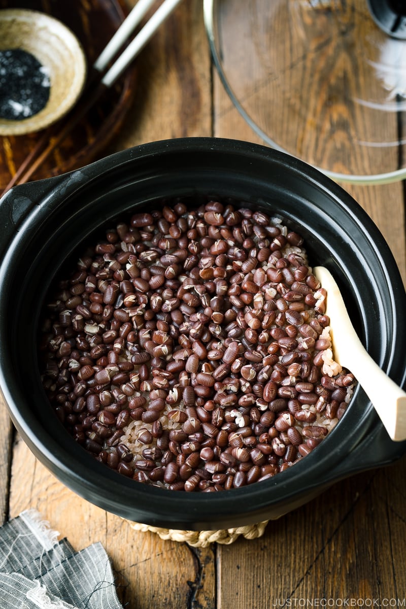 A donabe earthenware rice cooker containing Sekihan (Red Bean Rice).