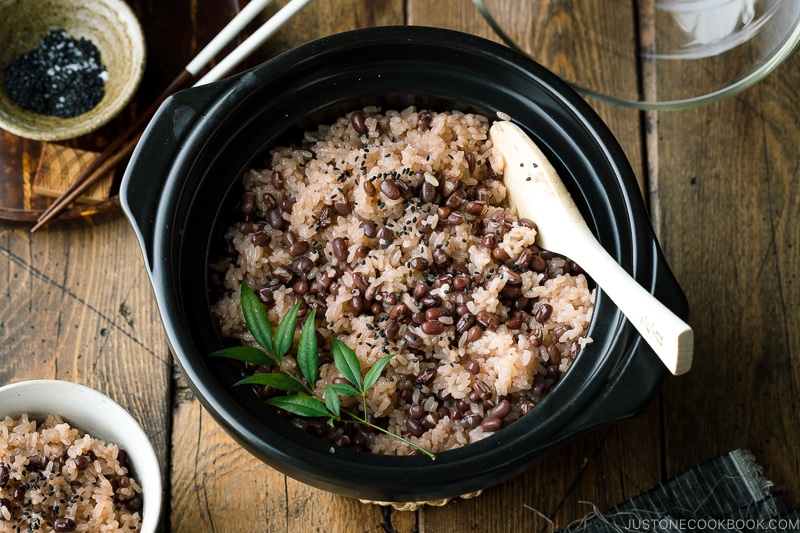 A donabe earthenware rice cooker containing Sekihan (Red Bean Rice).