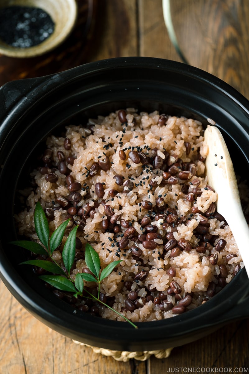 A donabe earthenware rice cooker containing Sekihan (Red Bean Rice).