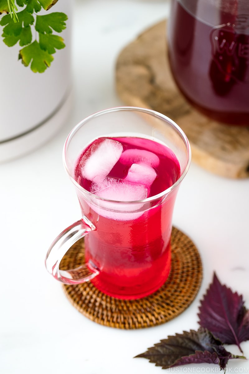 A glass containing Aka Shiso Juice.