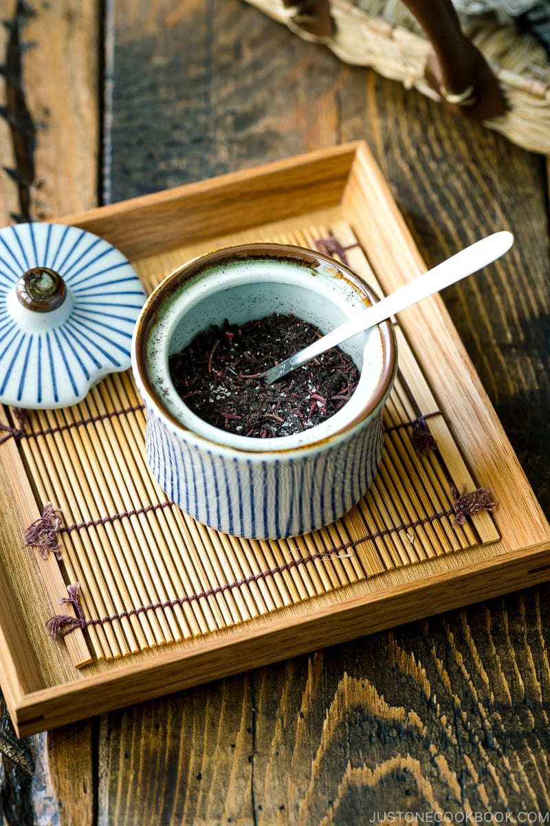 A little Japanese condiment jar containing Yukari rice seasoning.