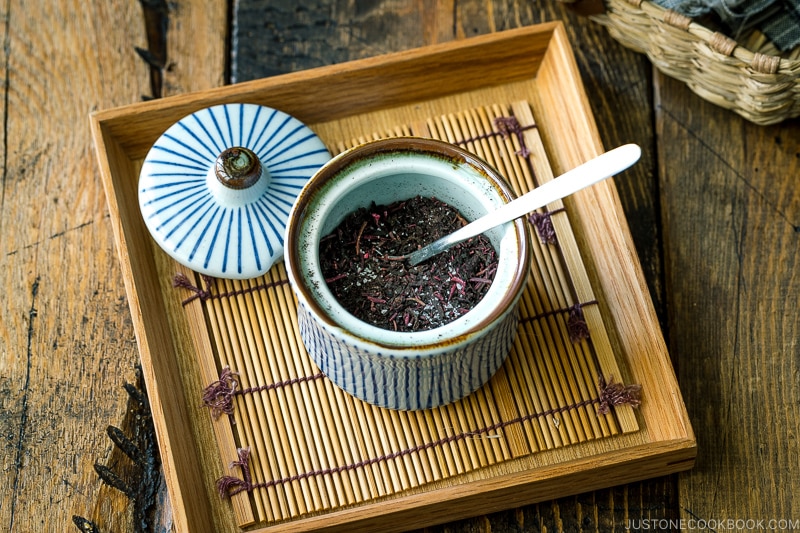 A little Japanese condiment jar containing Yukari rice seasoning.