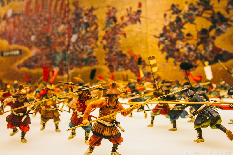 battle scene of miniature characters