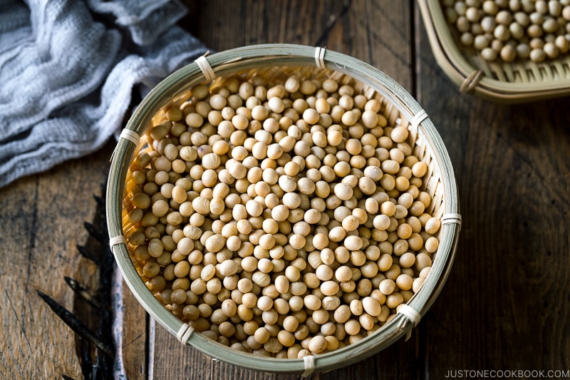 soybean in a bamboo tray on wood table