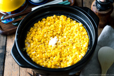 A donabe pot containing Japanese Corn Rice (Butter Shoyu Flavor).