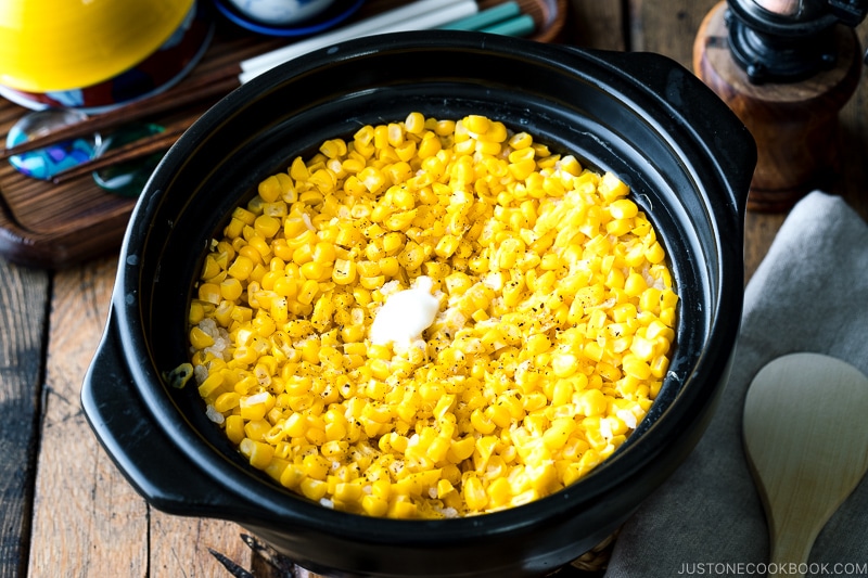 A donabe pot containing Japanese Corn Rice (Butter Shoyu Flavor).