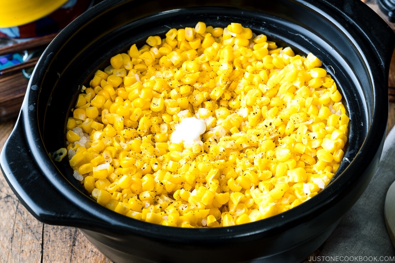 A donabe pot containing Japanese Corn Rice (Butter Shoyu Flavor).