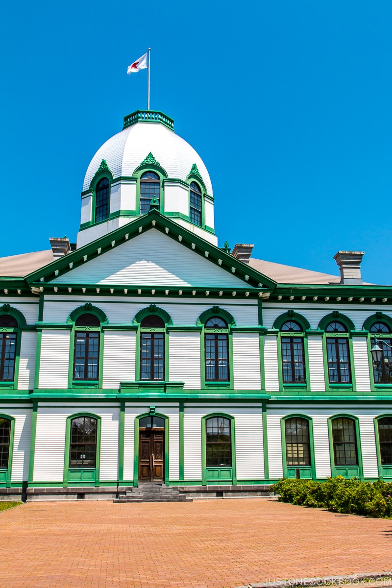 a white three story building at Historical Village of Hokkaido