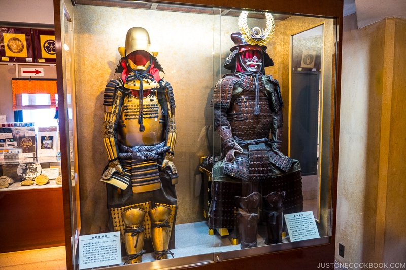 samurai armor in a glass display case