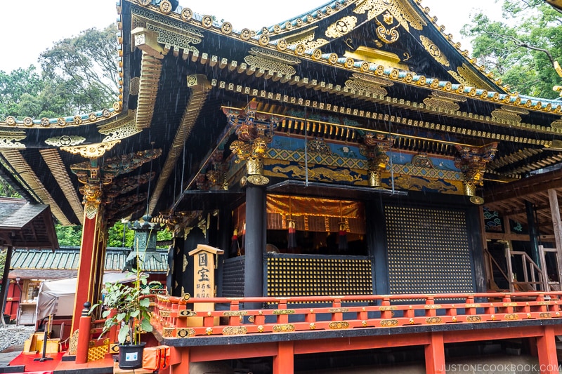 main red, gold, and black shrine building