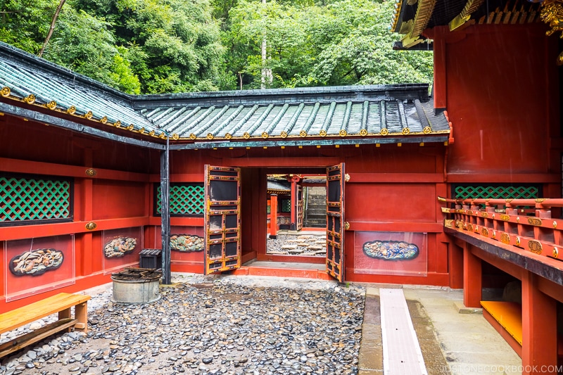 stone walkway next to the shrine