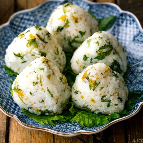 A Japanese plate containing Ume Miso and Shiso Onigiri.