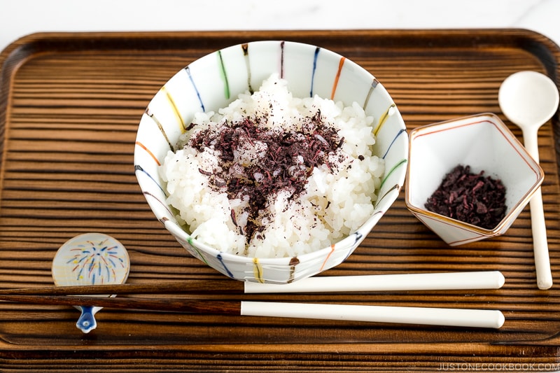 A rice bowl containing steamed rice topped with Yukari Shiso Rice Seasoning.