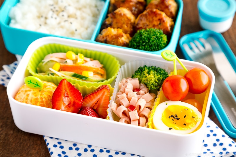 Bento box filled with delicious foods.