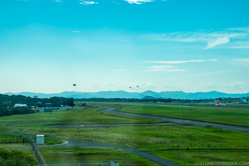 fighter jet taking off in a distance