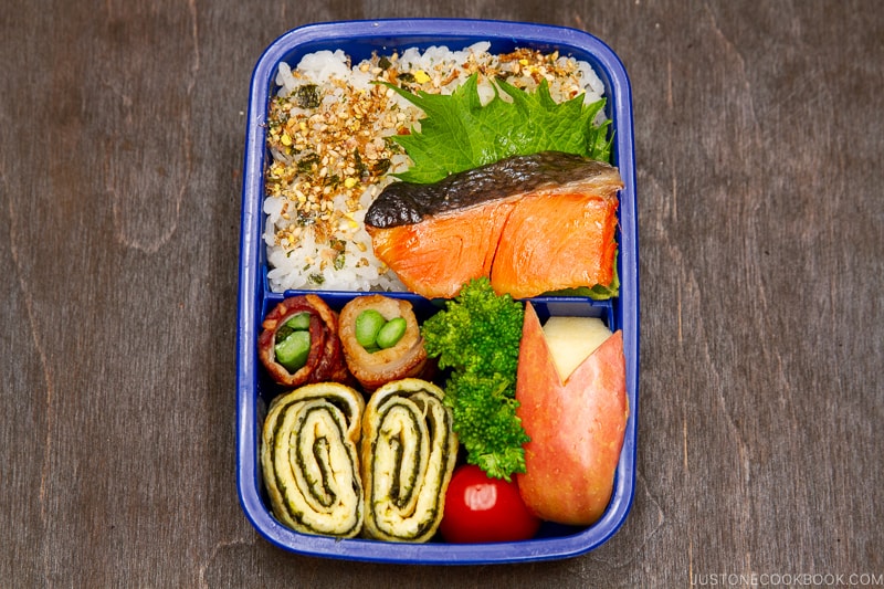 A bento box filled with Japanese food.