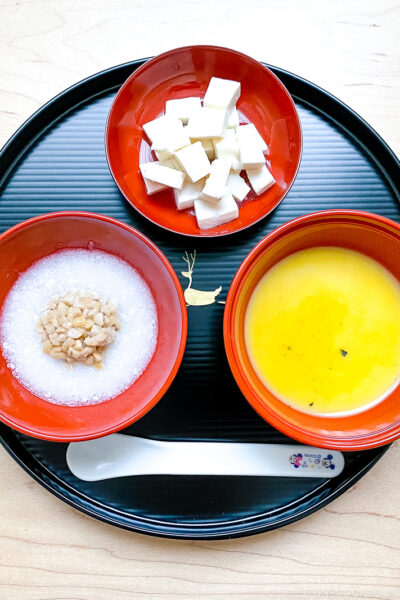 A tray with 3 bowls of Japanese baby food for age 7-8 months