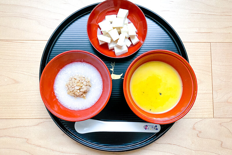 A tray with 3 bowls of Japanese baby food for age 7-8 months