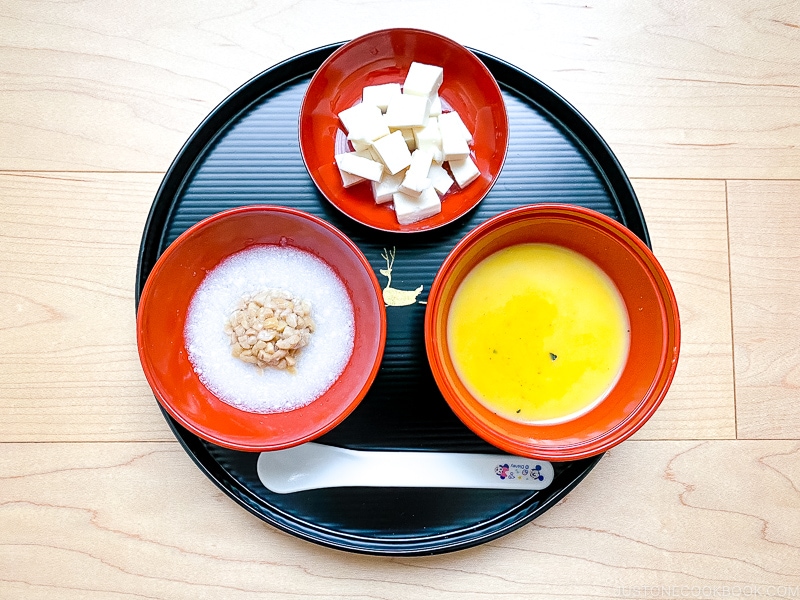 A tray with 3 bowls of Japanese baby food for age 7-8 months