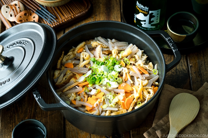 A black Staub containing Okowa (Japanese Mixed Glutinous Rice).