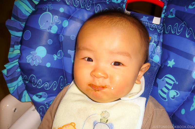 baby with food on mouth