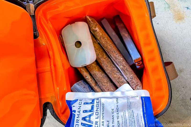 packaged dog food in a cooler