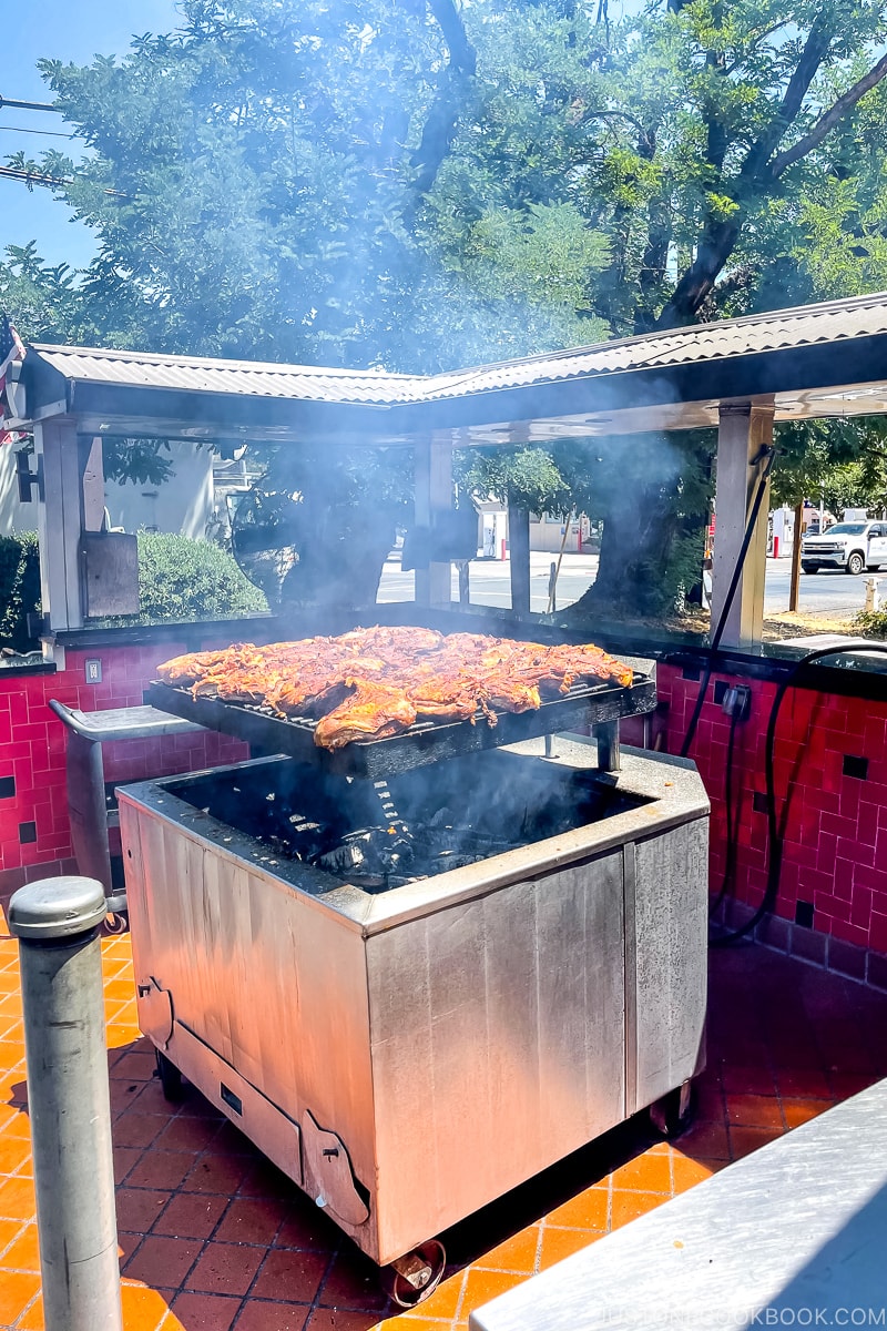 meat grilling over woodfire