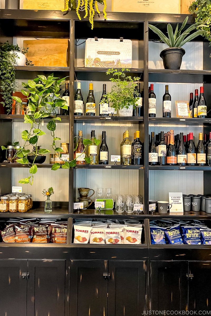 wine bottles on a shelf in Sam's General Store