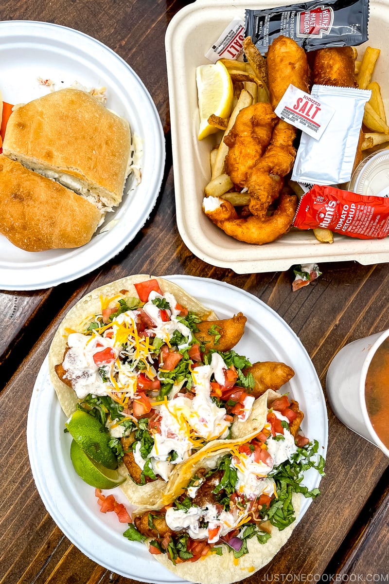 fish and chip and fish tacos on a table