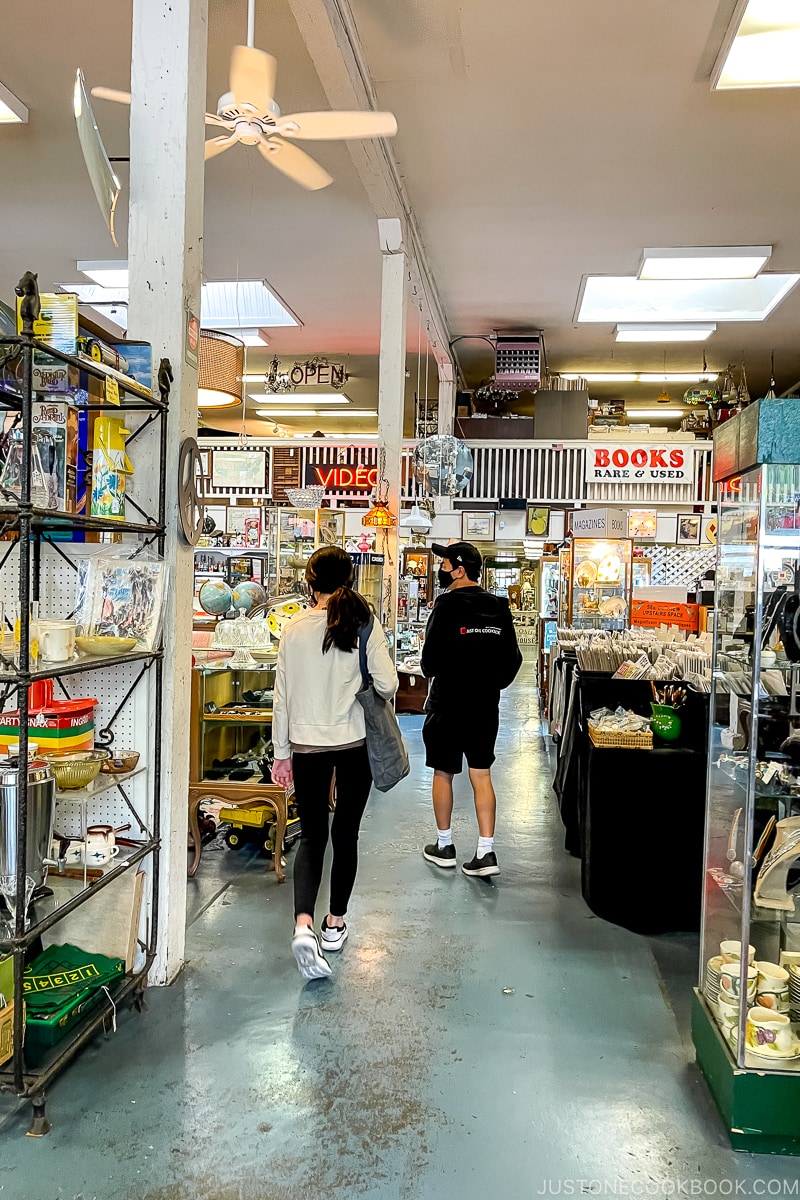 people browsing inside antique store