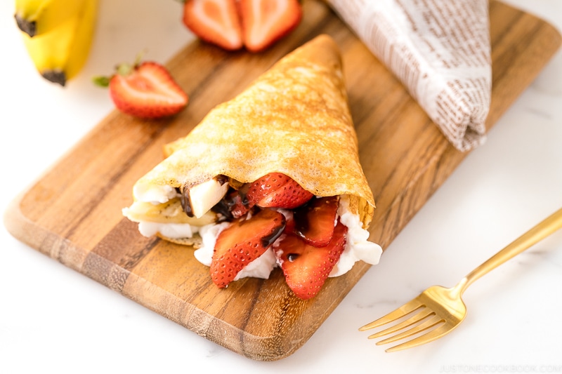 Japanese style crepes on the wooden board.