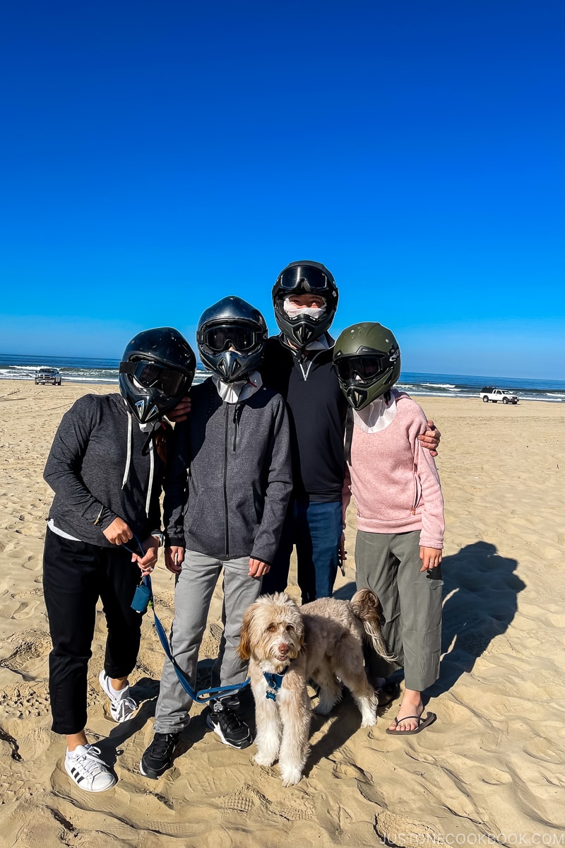 four people with helmet